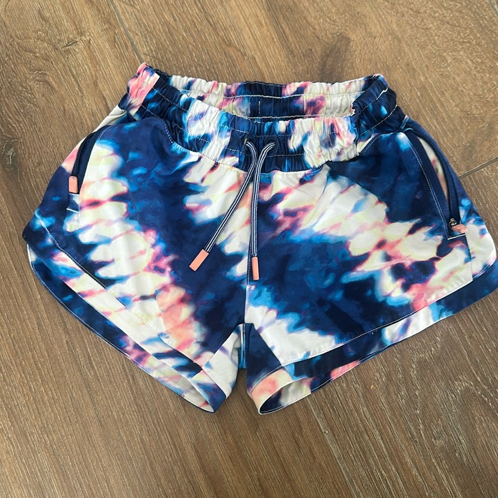 Athleta Girl shorts. Tye dye pink-blue. Size 7.